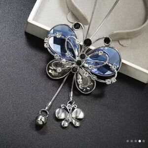 Beautiful Chic Silver and Blue Crystal Butterfly Necklace. NWOT.